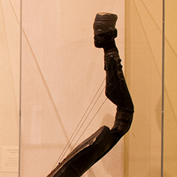 A harp displayed in a museum gallery