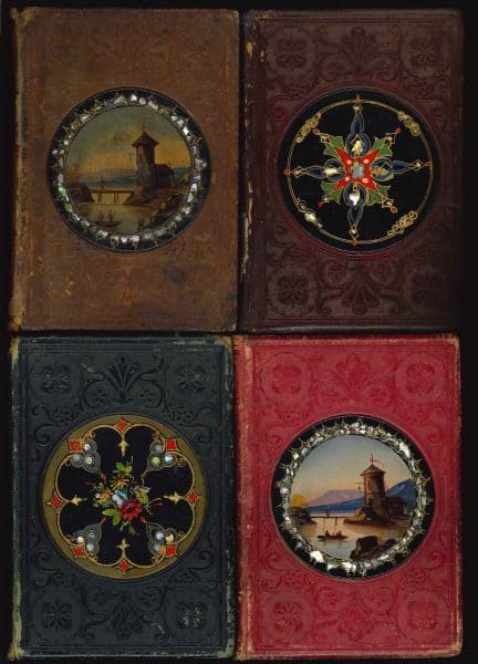 Front covers of Leavitt & Allen gift books with papier-mâché medallions, 1852-1853.