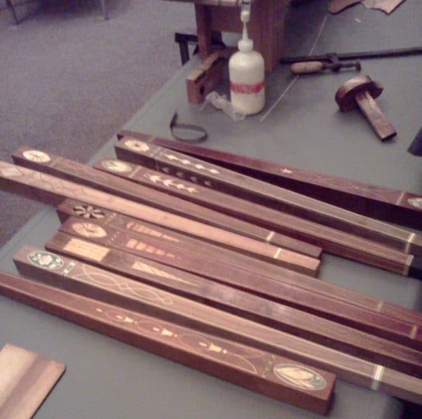 Examples of legs with inlay designs made by Stephen Latta.