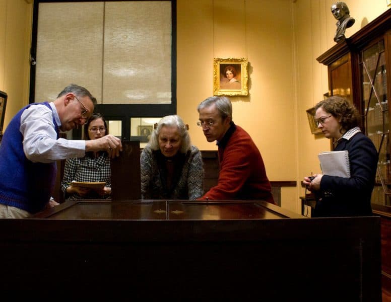 LCP shareholder Jay Robert Stiefel, LCP Curator of Art & Artifacts Linda August, LCP Trustee Beatrice Garvan, Furniture historian Adam Bowett, and Curator of the Germantown Historical Society Laura Keim examine the desk.
