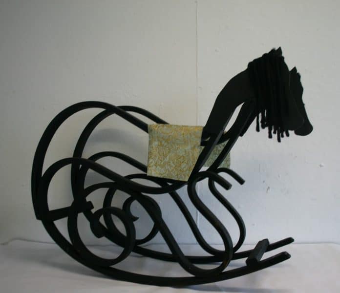Rocking Horse, wood, paint, yarn, fabric, and found rocking chair.  Inspired by Civil War-era paper dolls in the collections of the Library Company of Philadelphia.