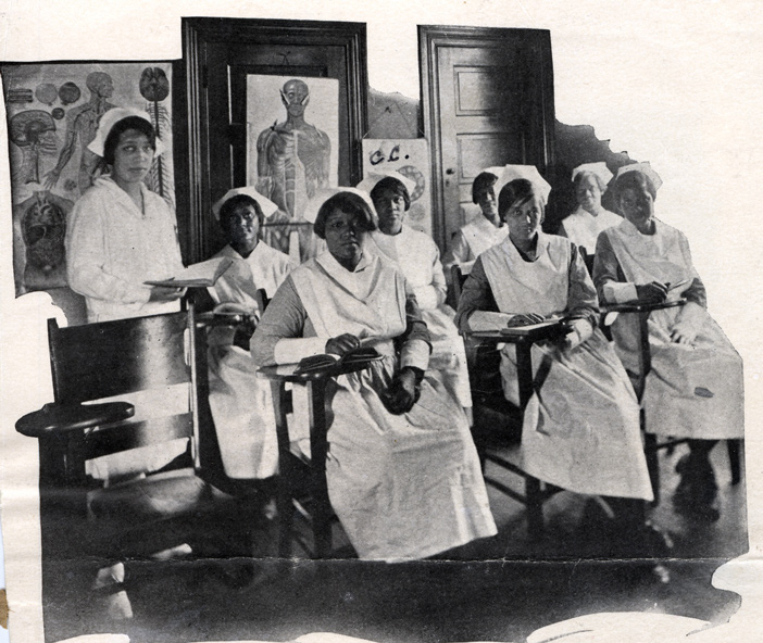 a photo of African American nurses in a classroom