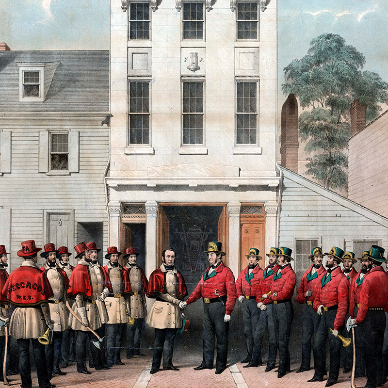 Scene depicting two groups of white volunteer firemen meeting in front of a three-story building with cupola. Two men in center shake hands.
