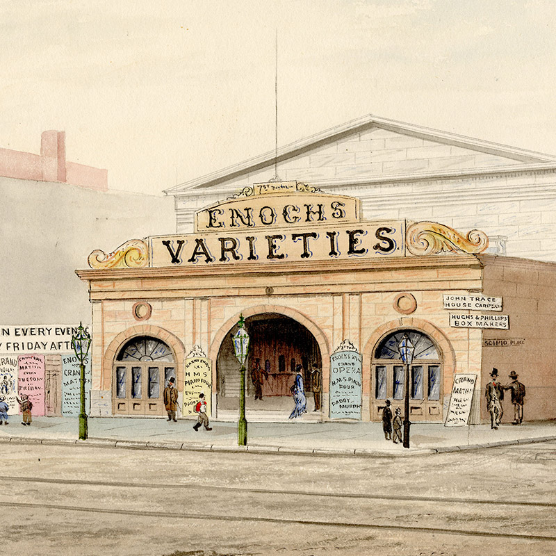 Nineteenth-century street scene with Enoch Varieties theatre building and plumbing storefront. Theatre building and adjoining fence adorned with posters. 