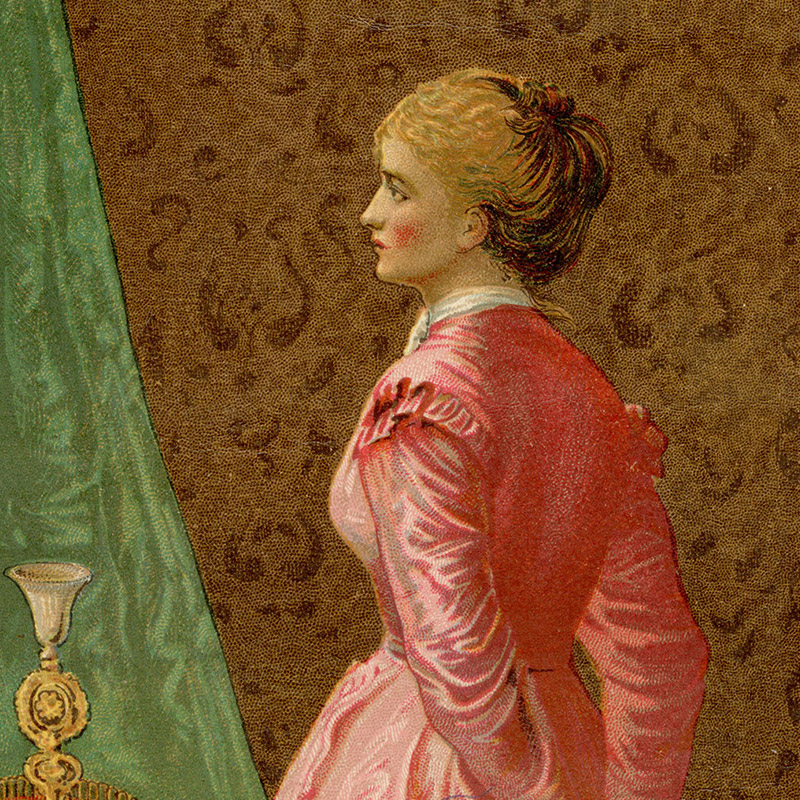 Late 19th-century card depicting the back of a white woman in a pink, long-sleeved dress and holding a small photograph behind her. 