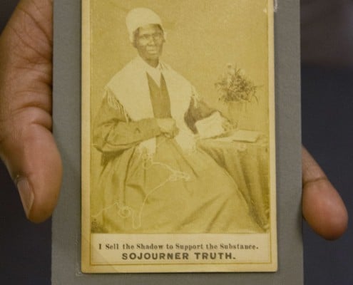 Jasmine Smith, LCP African American history subject specialist, holds a rare trading card type photo of abolitionist speaker Sojourner Truth.