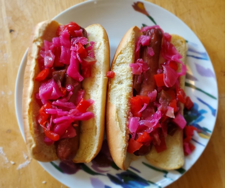 Hot dogs served with pepper hash