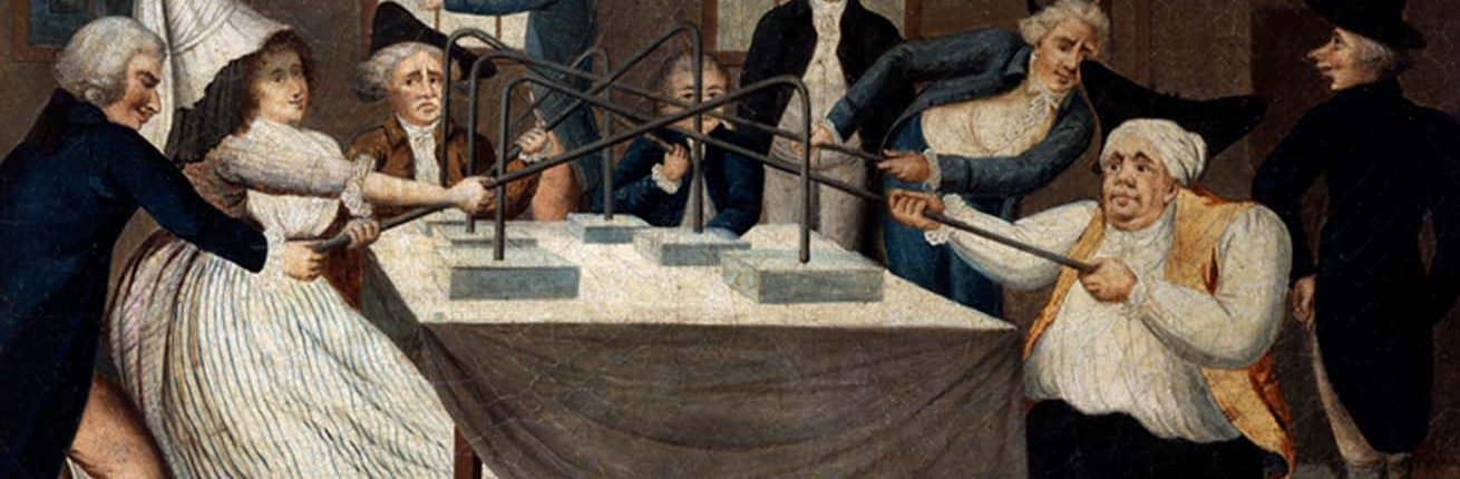 Detail of late 18th-century watercolor of white men and women around a table, some seated, some standing holding metal pipes for magnetic therapy.