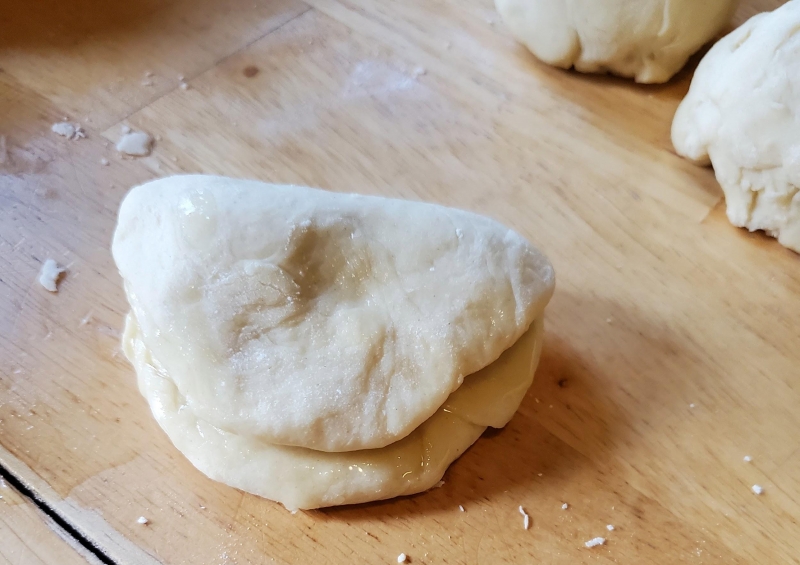 Image of Katie's attempt to fold the dough like the illustration.