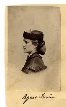 Photograph of profile portrait of a young Agnes Irwin wearing a hat