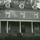 Black and white photograph of exterior of house
