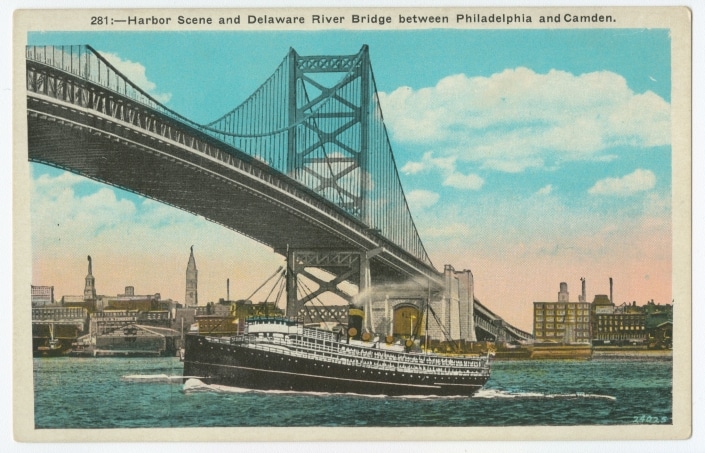 Postcard showing Benjamin Franklin Bridge with a large boat passing underneath
