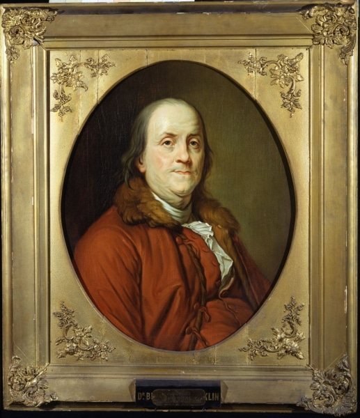 Photograph of oil portrait of Benjamin Franklin in gold frame