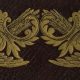 Detail of gilt birds from book cover.