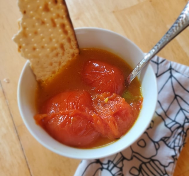 Indian stew of tomatoes served with leftover matzo