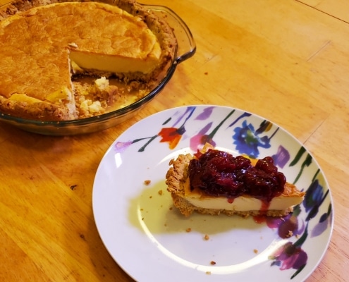 Cheesecake served with cranberry jam