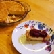 Cheesecake served with cranberry jam