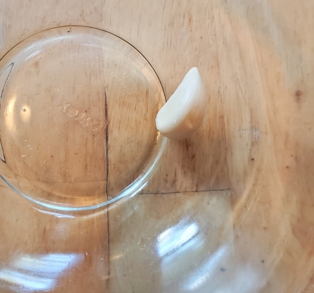 Garlic in clear glass bowl