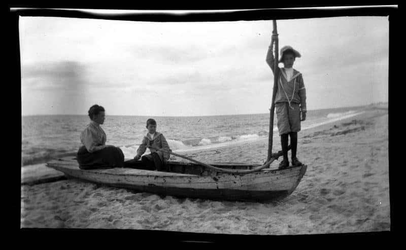 Two boys and woman in boat, Sea Girt Marriott C. Morris Collection [P.2013.13.82]