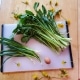 Ingredients for dandelion salad with scallion dressing
