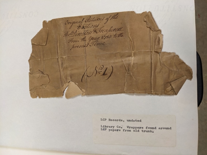 Photograph of paper wrapper used around folded records